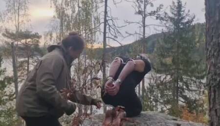 Man in steel restraints outdoor