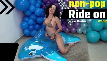 Beatriz Enjoys a Fun Ride on Her Blue Intex Whale