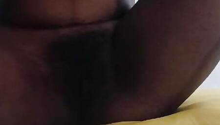 I am applying cream on my pussy and rubbing it with my finger.