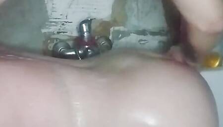 Camera in the Bathroom and a Girl with a Big Ass Is Peeing, Very Sexy