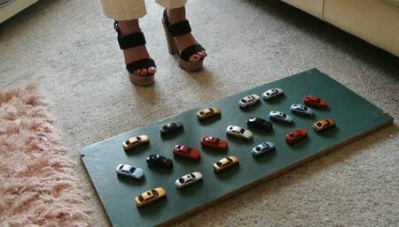 GIANTESS Charn crushes 20 tiny toy cars in chunky high heels high left view feet foot toy car crush