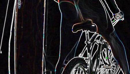 Kind of hot lady riding a bike only in thong panties
