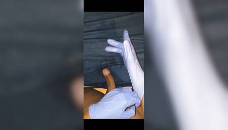 Larino boy Getting his dick hard while using gloves with precum