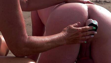 On the beach, I train the ass of my cuckold husband