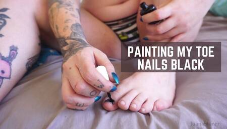 Painting my toe nails black