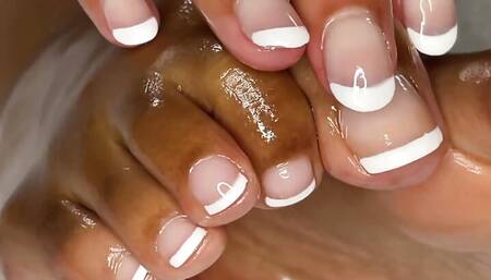 MILF Rubs Oil All Over Her French Pedicure Feet