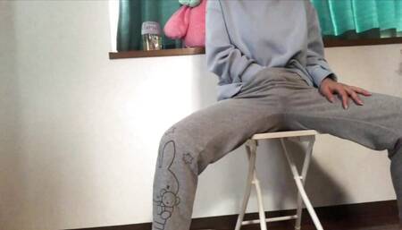 Cute Japanese short-cut dark-haired woman masturbates with a toy during the day.