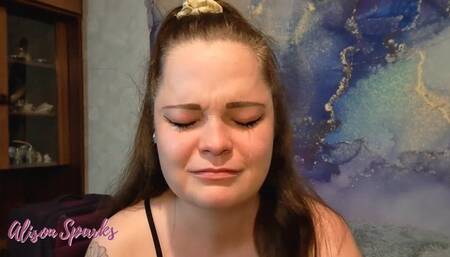 Crying and wiping my tears