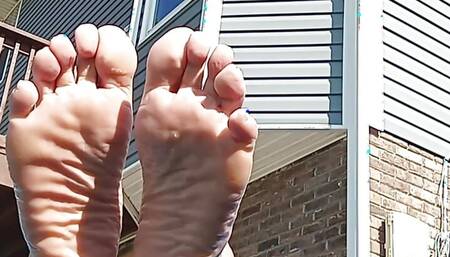 My Girlfriend showing off her toe's soles and tits in the pool