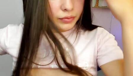 Cute horny young girl with a cute face gets her throat stuffed with a big dildo while a toy vibrates inside her pussy