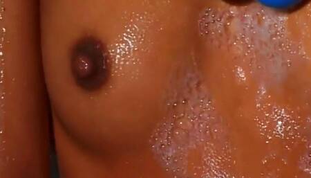 Brunette teen Little Lupe fingering her pussy in shower