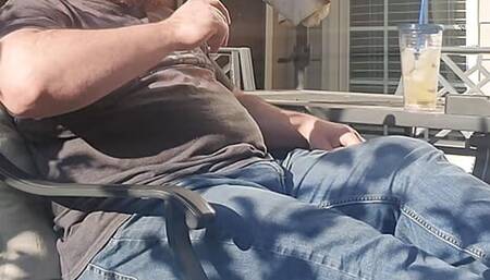 Smoking a good cigar on the deck