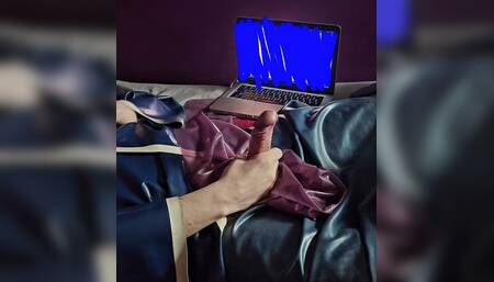 Latex fetish addict jerking big cock to porn in latex robe with latex sheets big cock cumshot