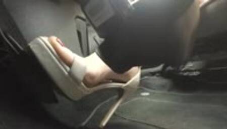 Woman drives in Sexy White Platform Sandals - PEDAL CAMERA