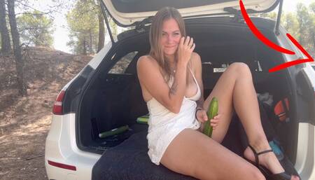 Playing with a cucumber sooo close to the road