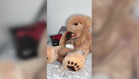Tilly Toy rides Mr. Bear