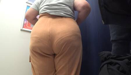 The camera in the fitting room watches a mature big ass in satin panties. Curvy milf changes clothes. PAWG