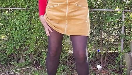 Cd outside in new miniskirt.  Feeling my nylon self all over.