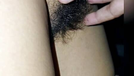 Husband playing with my dark hairy pussy