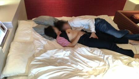 Passionate couple seeking each other's bodies at a hotel
