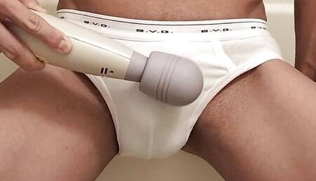 Wear white BVD bikini briefs and masturbate with an electric massage machine.