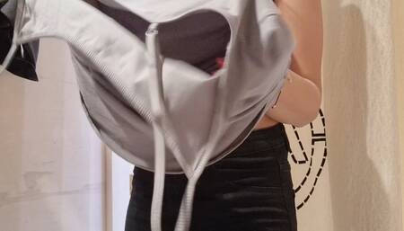 the curtain in the fitting room is open, I flash my tits