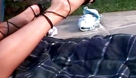 Sexy lesbian blondes having outdoor fuck with dildo