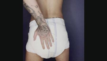 Tattoo'd Boy Wets and Messes Diaper