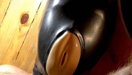 Latex Mask Filled with Sperm From His Cock!