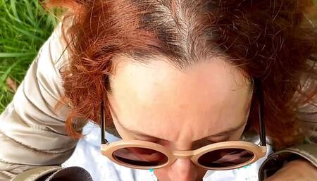 Milf Natasha gives risky blowjob outside and swallows the cum.