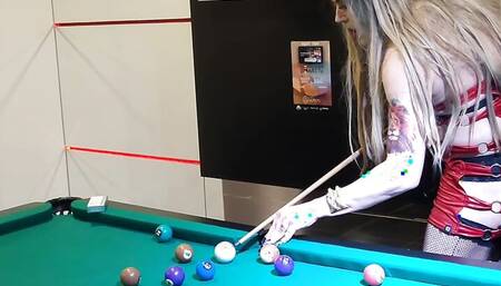 Holly smoking and playing pool