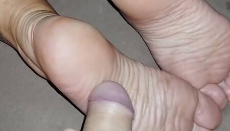 He licked the soles of his stepmother and finished on them