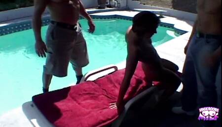A Brunette Gets Slammed by Two Hard Cocks After They Watch Her Sunbathe
