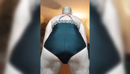 Wearing wife's swimming costume