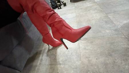 Kalinda in red boots and gloves