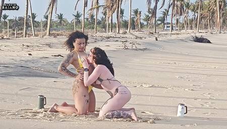 TWO LESBIAN CHICKS PLAYING ON THE BEACH GOT PICKED UP BY A TOURIST AND HAD THEIR ASSES FUCKED