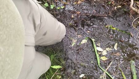Woodland self piss pants wetting and mud sinking