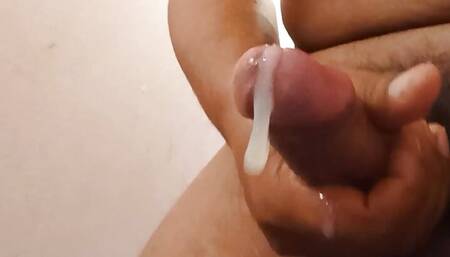 A young man is masturbating and screaming in pain