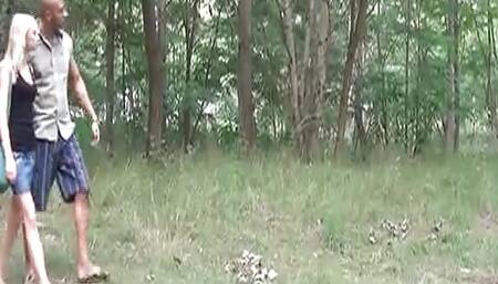 Skinny blonde German babe rides BBC outdoors
