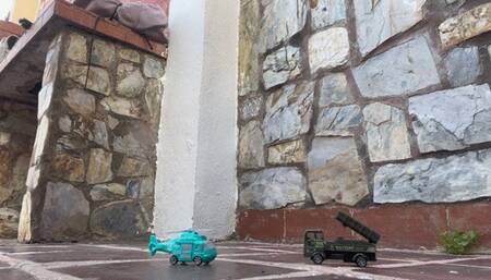 Balbina the Giant car crusher in sexy yellow heels