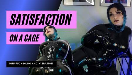Latex Domina satisfies herself above her Rubber Gimp in the cage