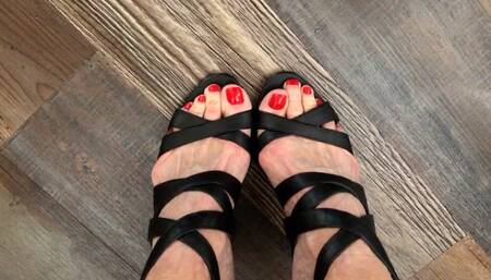 Toe Wiggling In Black Strappy Sandals