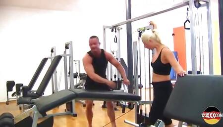 Fit Blonde Babe Working Out a Hard Cock in the Gym