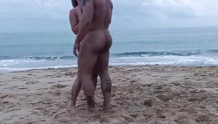Romantic Dance of a Naked Couple on a Public Beach