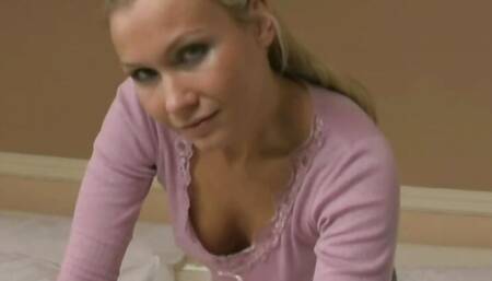 German blonde feeds her hungry pussy
