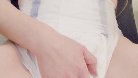 Wetting diaper while sitting and masturbating