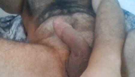 Sexy man with chest hair and big balls jerking his big dick with hot moanings
