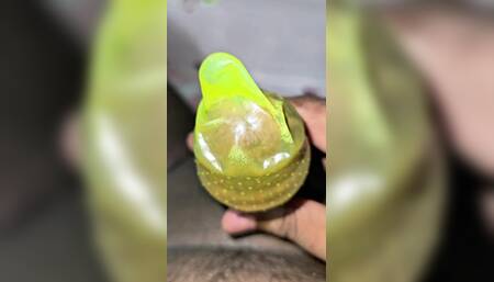 Masturbating and cam inside condom piss and sperm