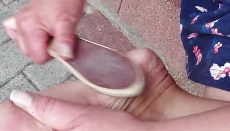 Outdoor foot care on the left foot