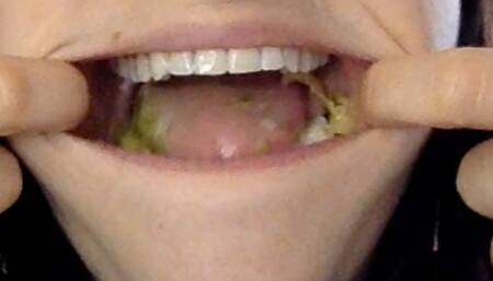 White fangs crunching pickles